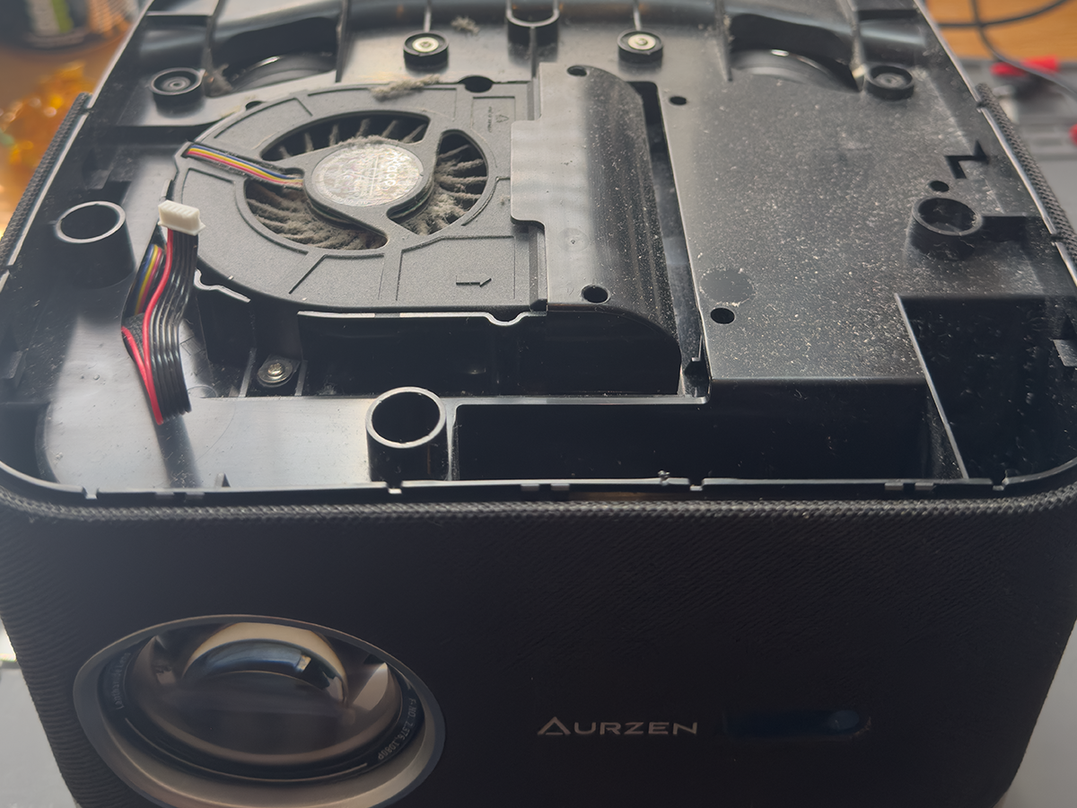 Aurzen projector opened during lens cleaning service