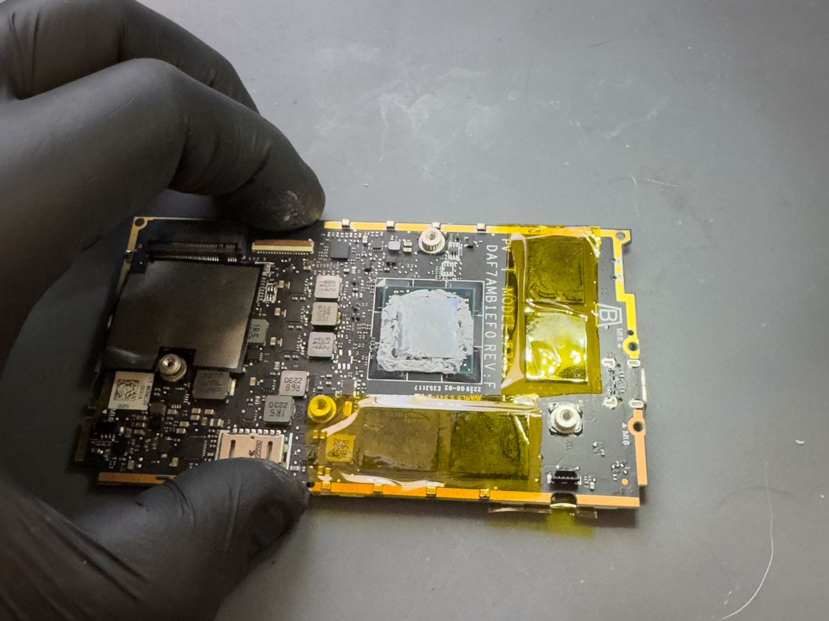Steam Deck motherboard during USB-C port repair