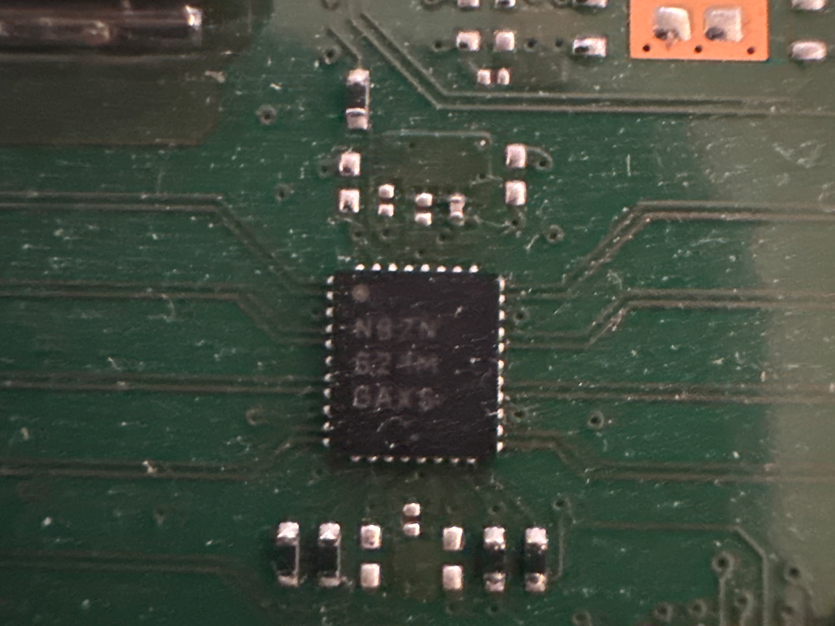 Close-up of an Xbox Series S motherboard showing the HDMI retimer chip